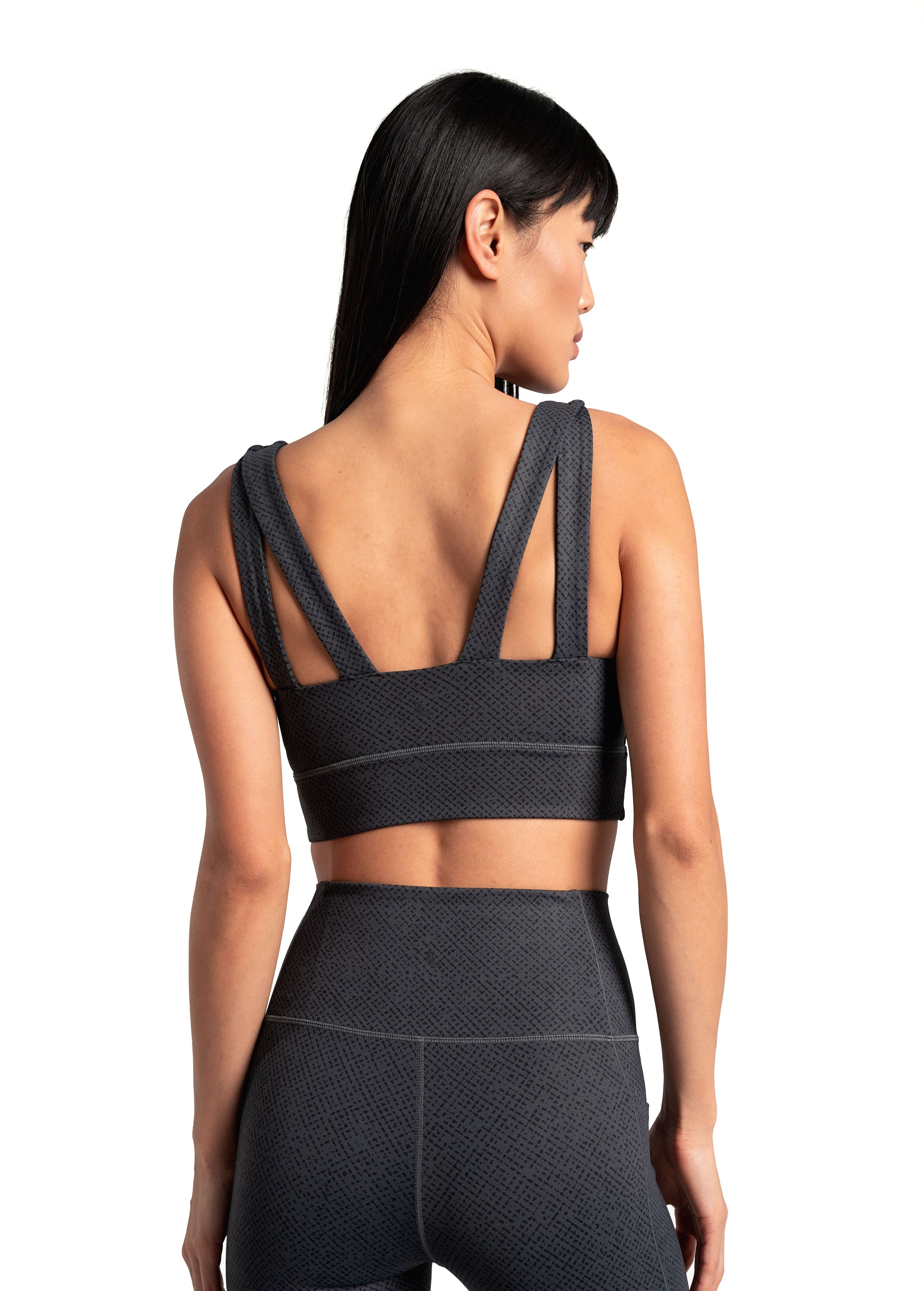 Lolë Step Up Bra in charcoal — this high-support longline sports bra sets you in motion