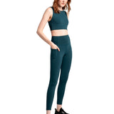 Lolë Step Up Bra in emerald — this high-support longline sports bra sets you in motion