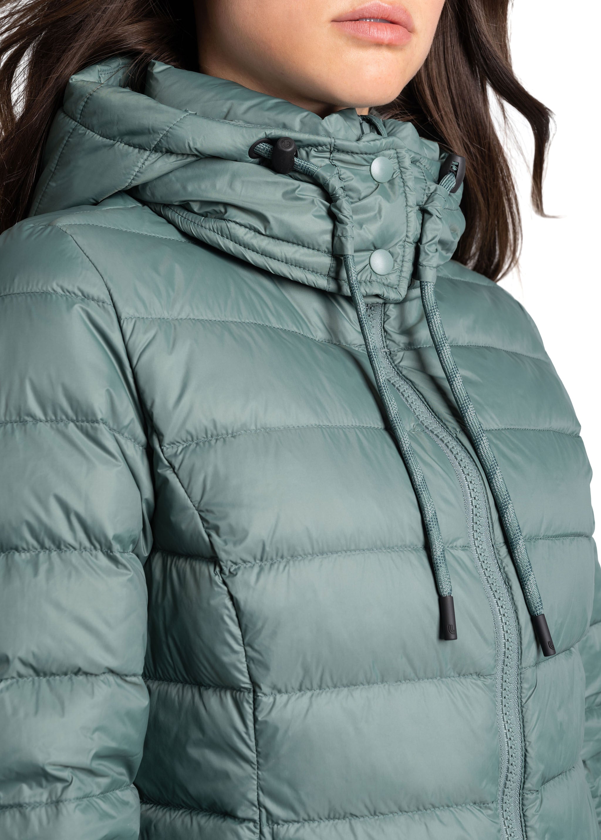 Lolë Emeline Down Jacket in blue — embrace the outdoors in style and comfort with the Emeline Down Jacket