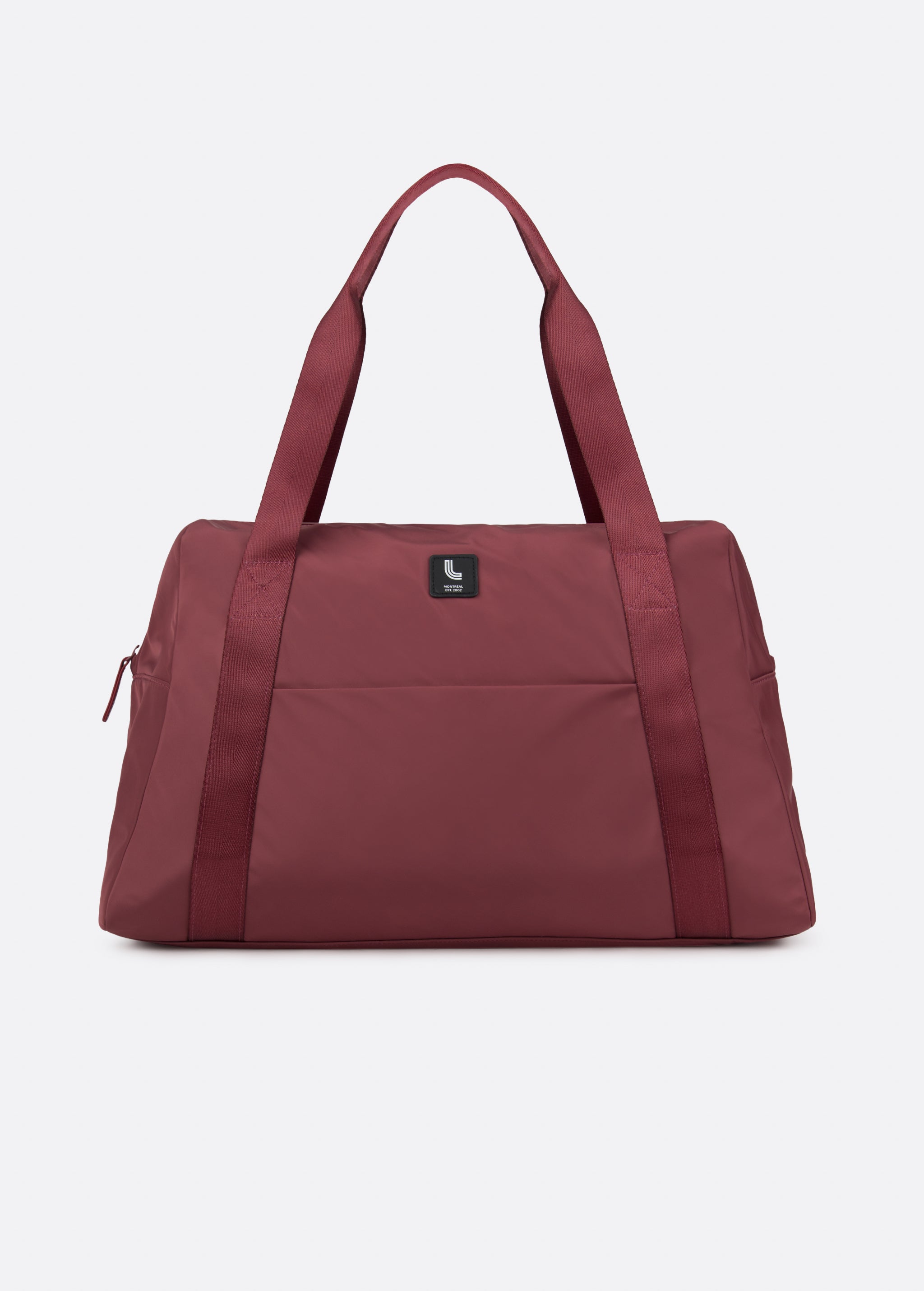 Lolë Westmount Duffle Gym Bag in Mauveberry dusty rose — gym bag energy, minus the gym-only look
