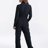 Lolë Forillon Jumpsuit in black — the Forillon long sleeve Jumpsuit is the ultimate packing piece