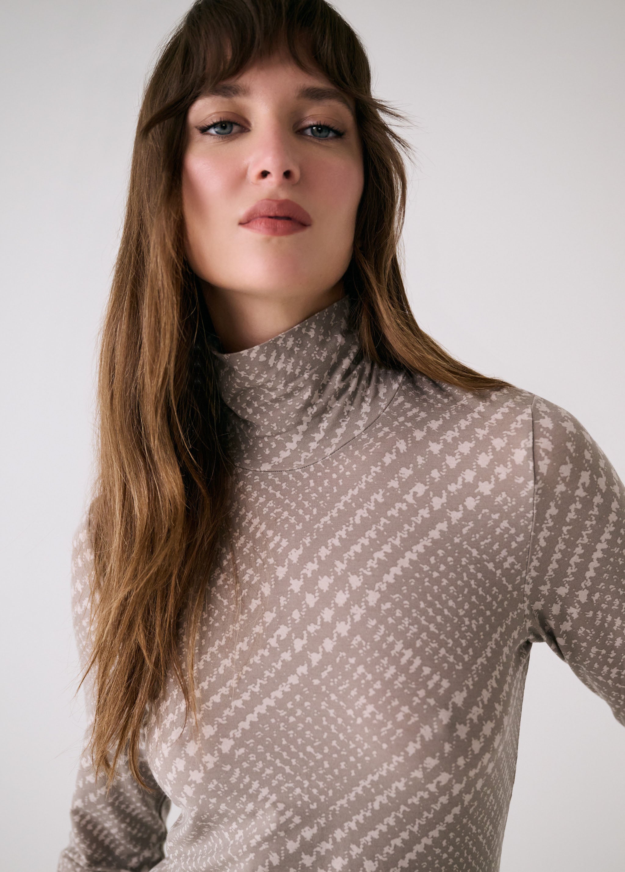 Lolë Dynamic Turtleneck Dress in beige plaid