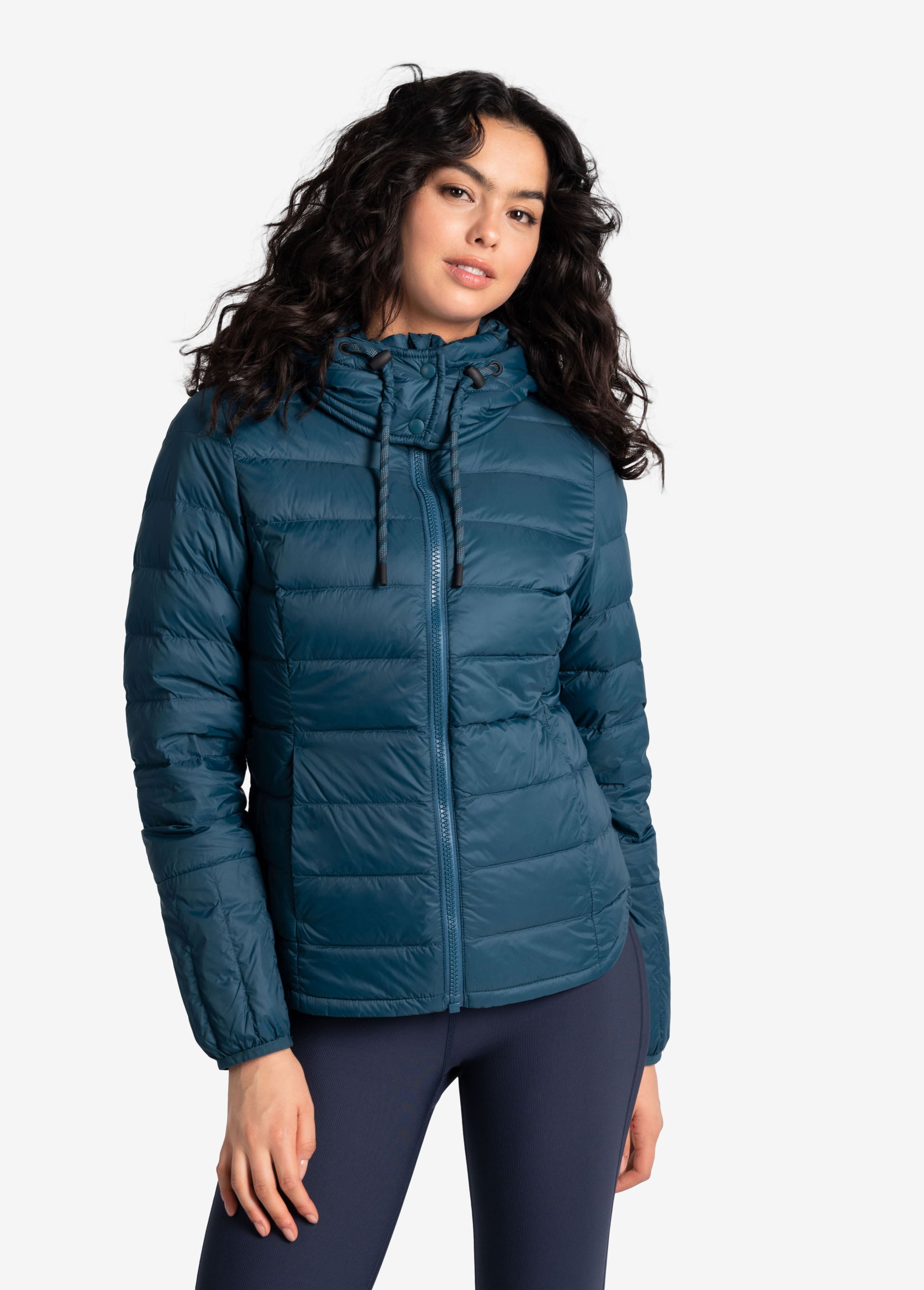 Lolë Emeline Down Jacket in blue — embrace the outdoors in style and comfort with the Emeline Down Jacket