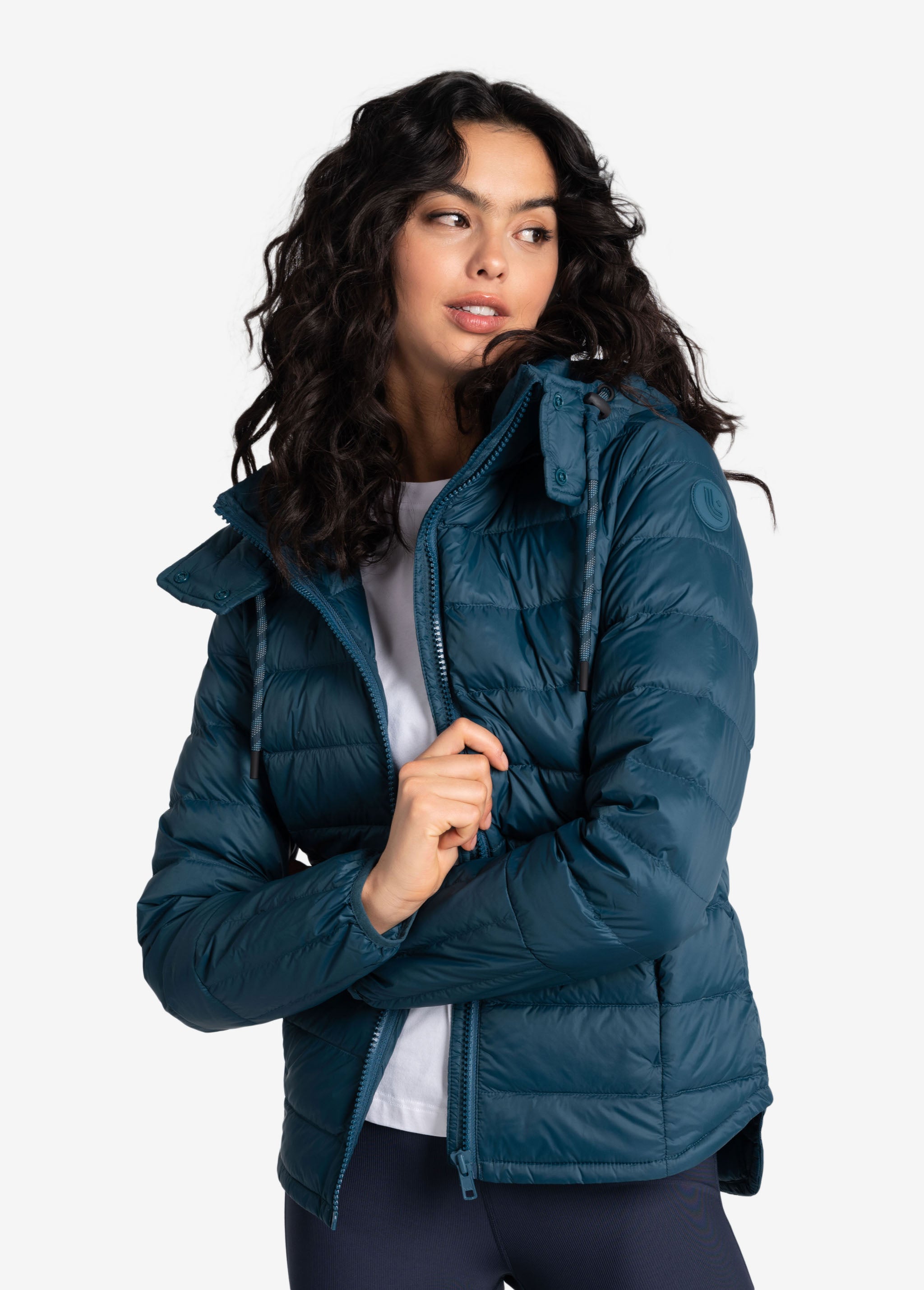 Lolë Emeline Down Jacket in blue — embrace the outdoors in style and comfort with the Emeline Down Jacket