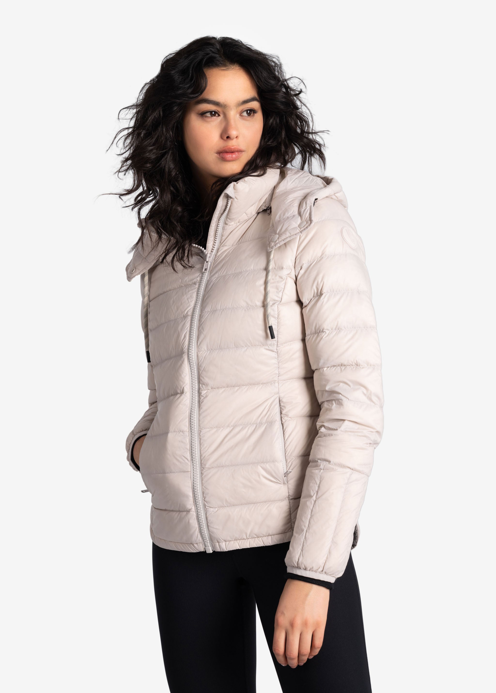 Lolë Emeline Down Jacket in Abalone pale greige — embrace the outdoors in style and comfort with the Emeline Down Jacket
