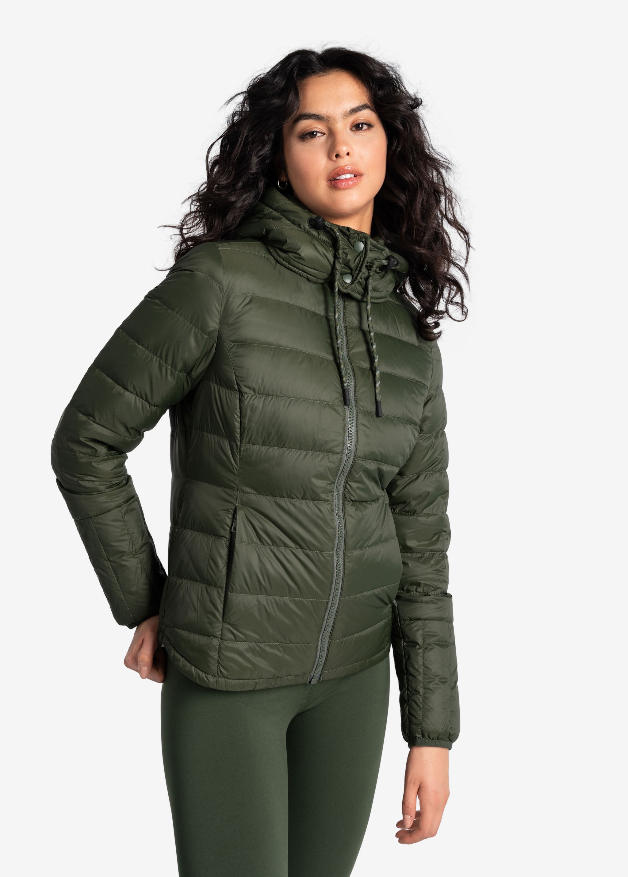 Lolë Emeline Down Jacket in Kombu olive green — embrace the outdoors in style and comfort with the Emeline Down Jacket
