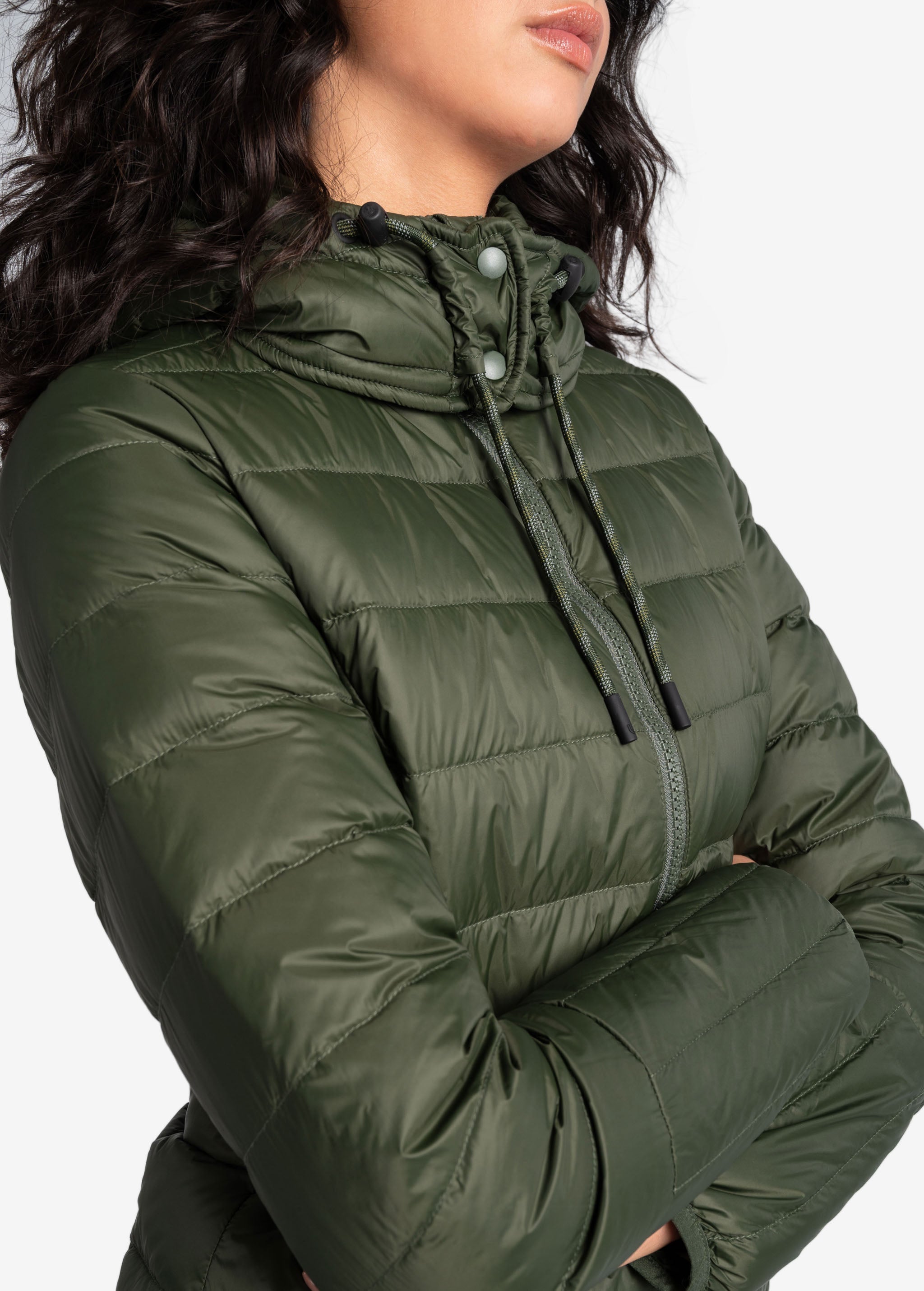 Lolë Emeline Down Jacket in Kombu olive green — embrace the outdoors in style and comfort with the Emeline Down Jacket