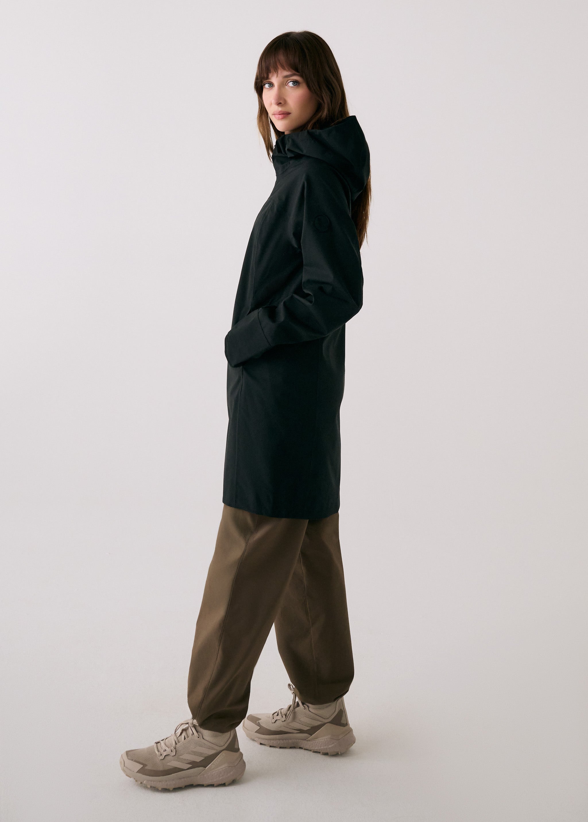 Lolë Element Long Rain Jacket in black — this longline jacket keeps water out while keeping your look sharp