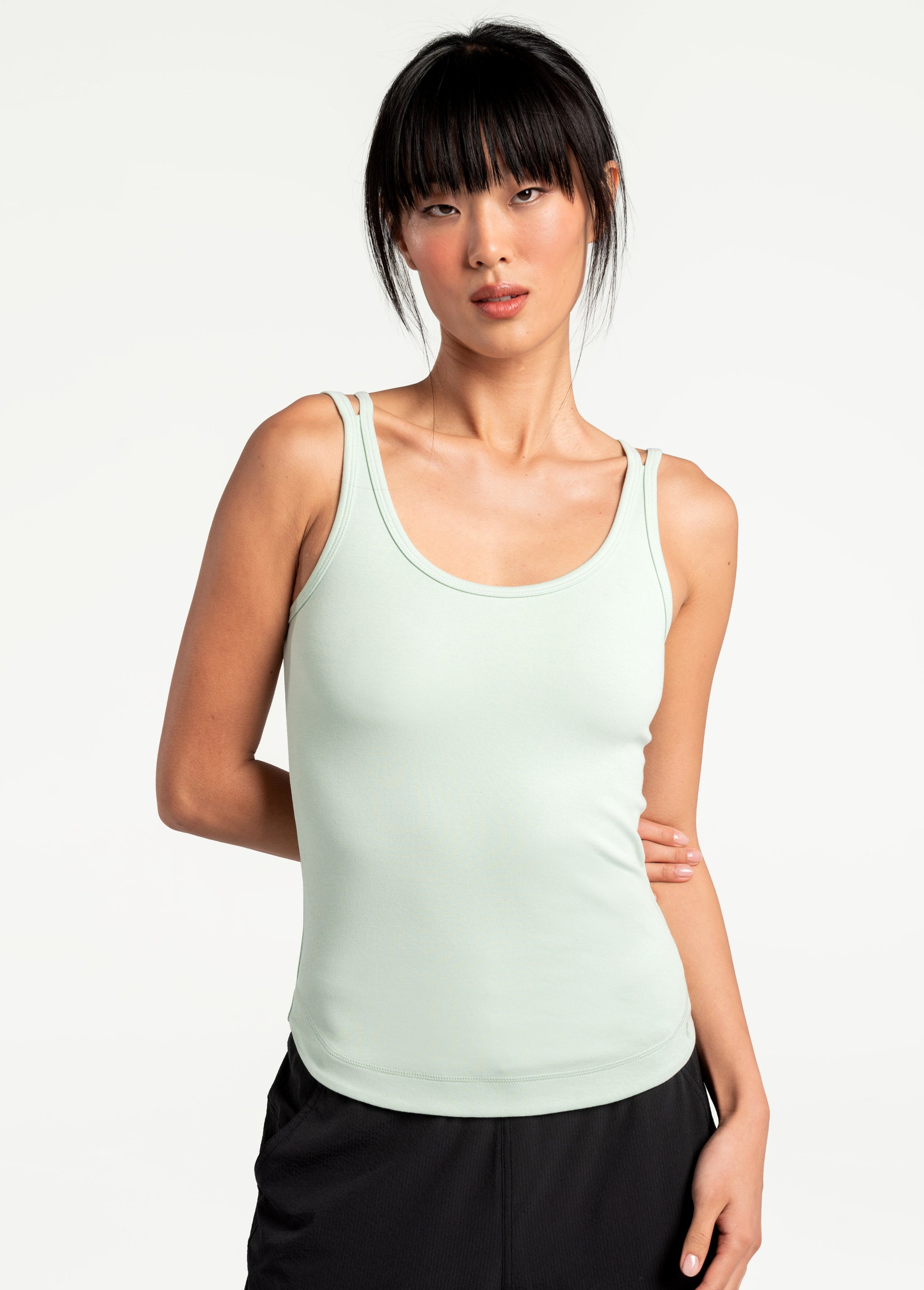 Lolë Organic Cotton Tank Top in green — comfort comes easy with this organic cotton tank top