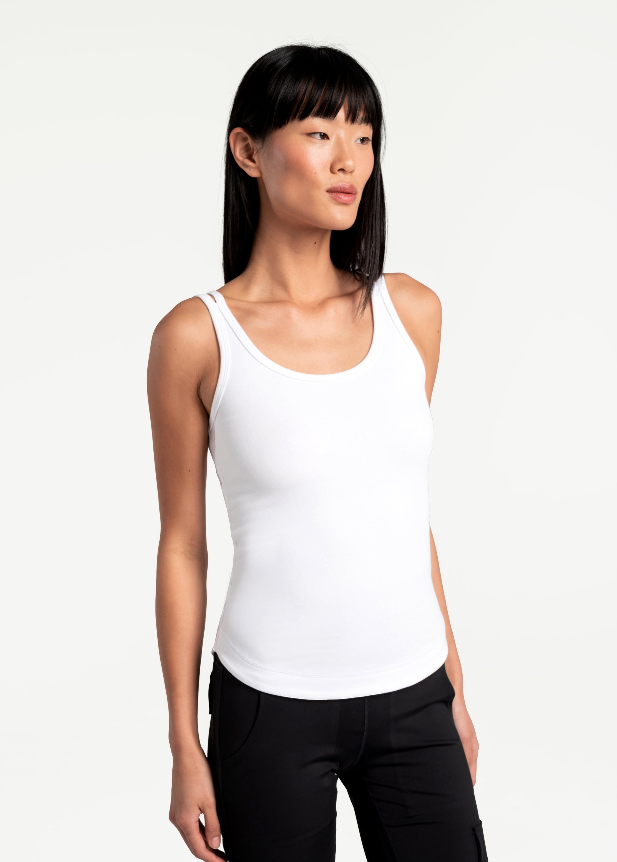 Lolë Organic Cotton Tank Top in white — comfort comes easy with this organic cotton tank top