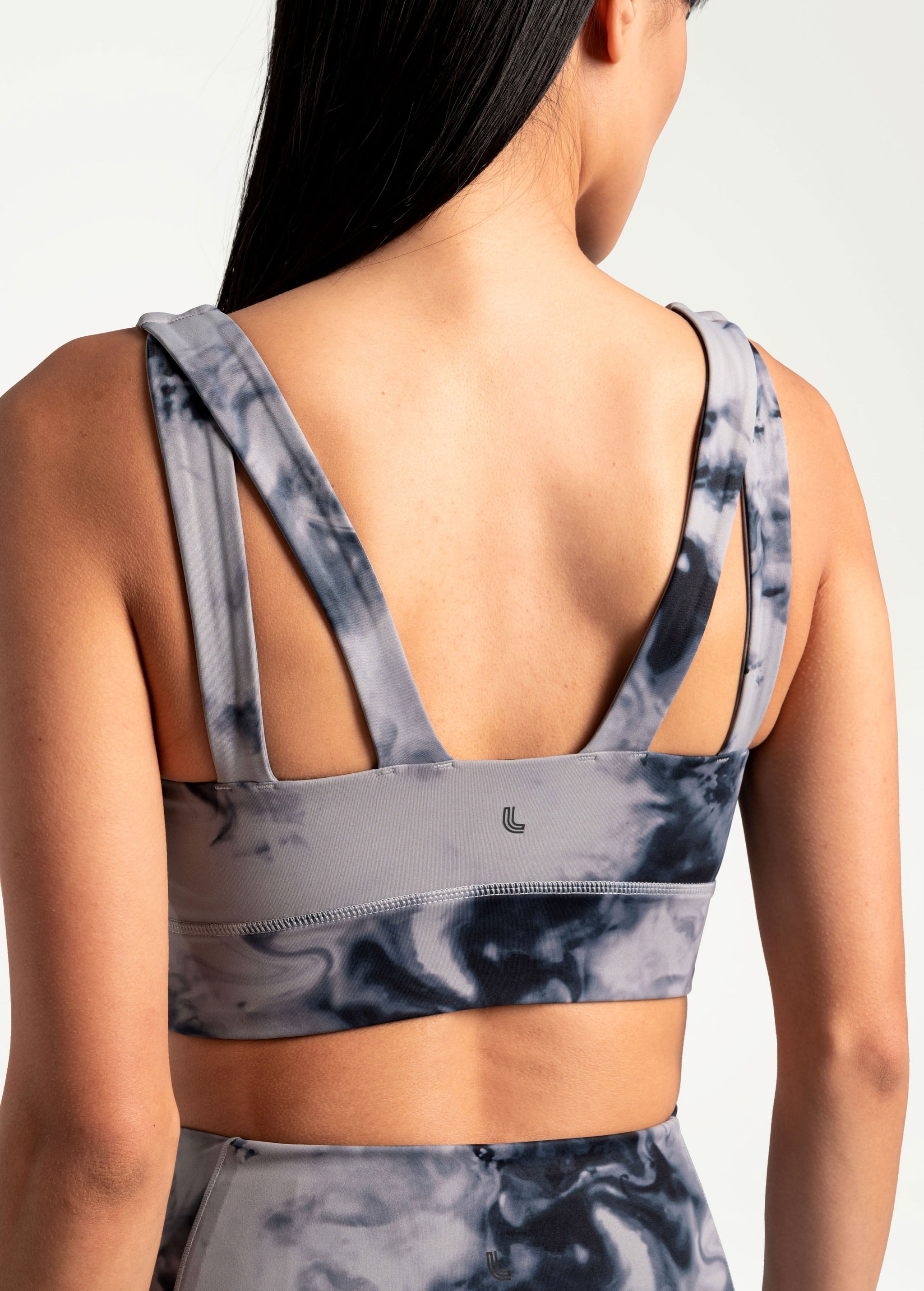 Lolë Step Up Bra in grey watercolour print — this high-support longline sports bra sets you in motion