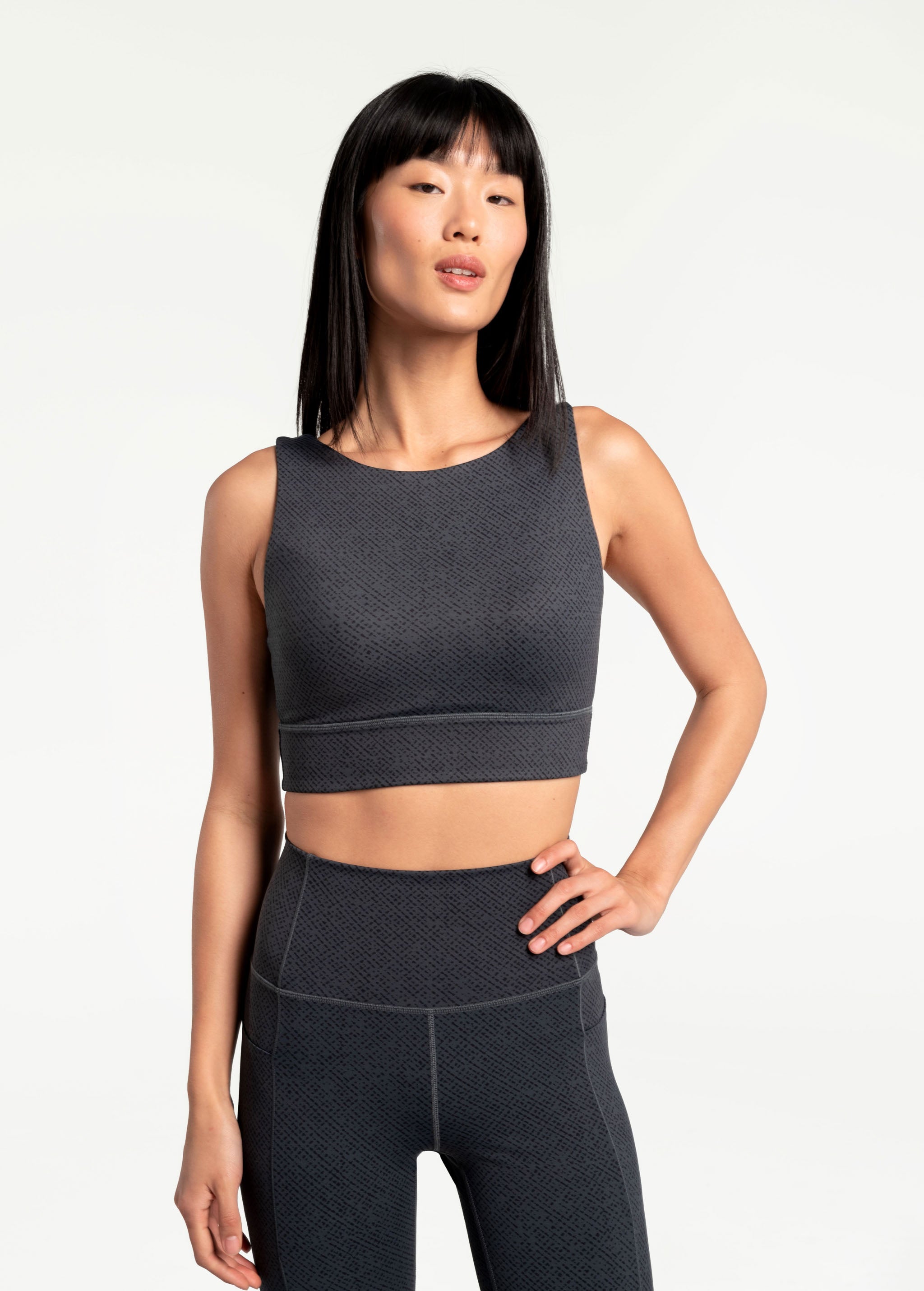 Lolë Step Up Bra in charcoal — this high-support longline sports bra sets you in motion
