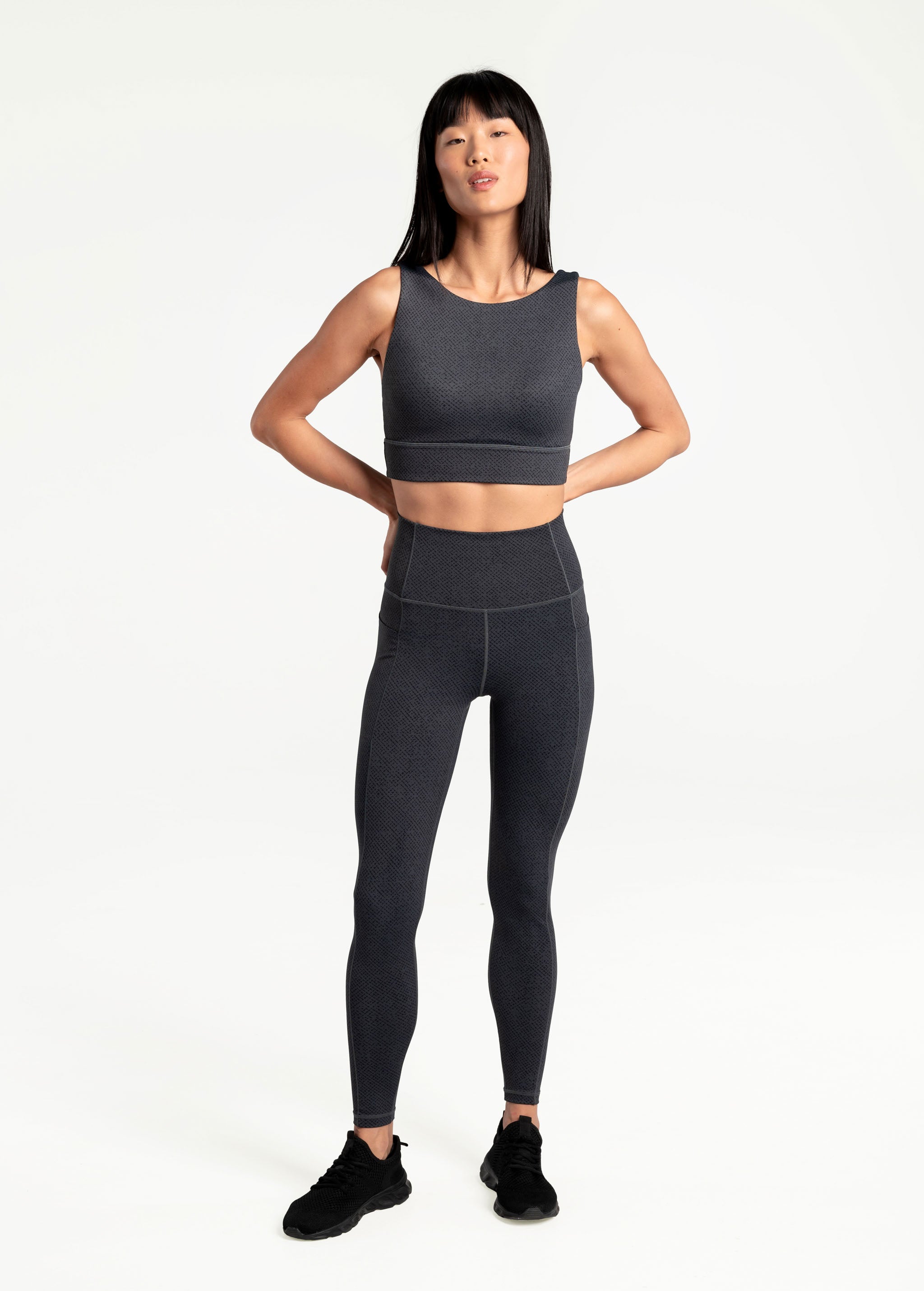 Lolë Step Up Bra in charcoal — this high-support longline sports bra sets you in motion