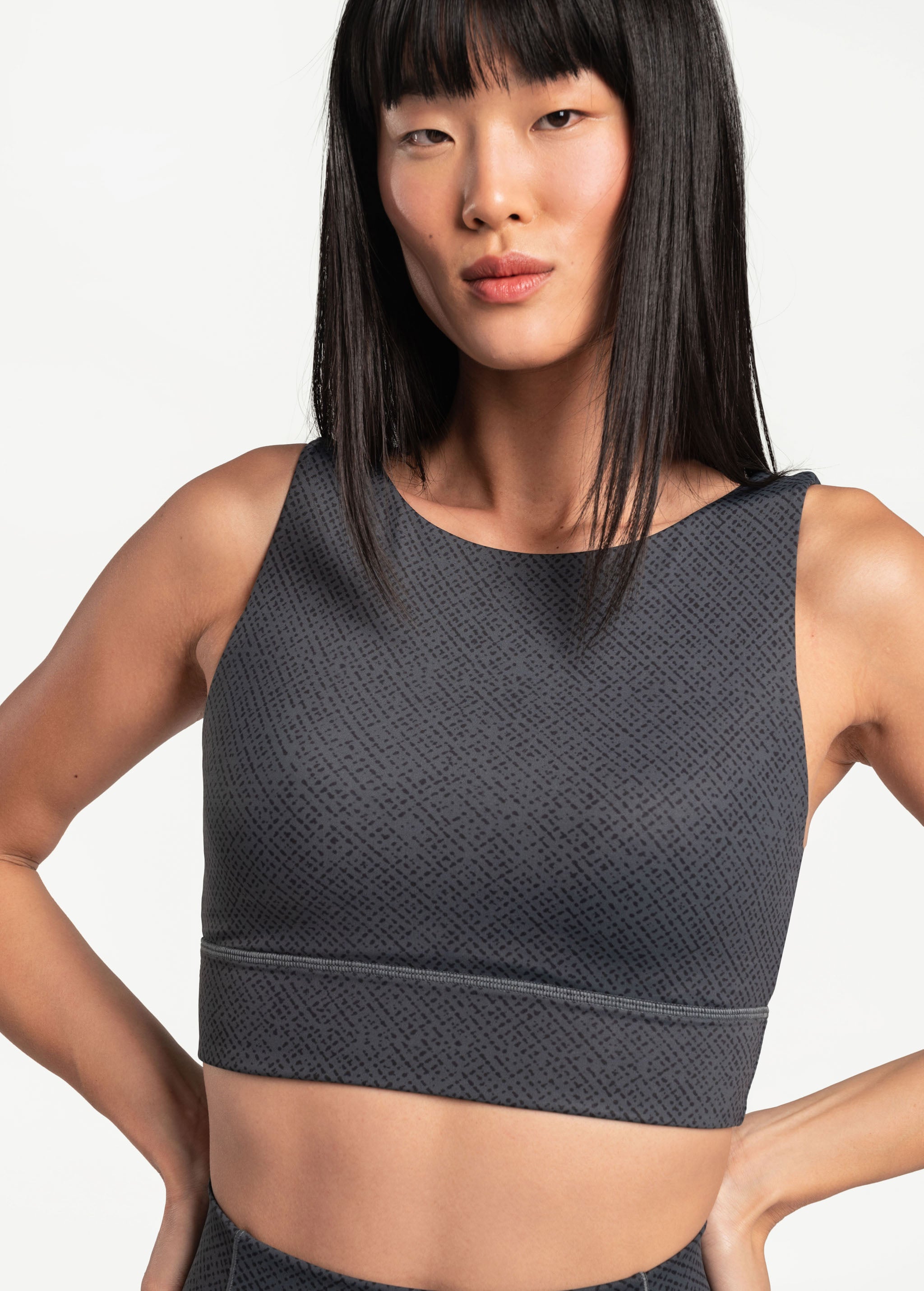 Lolë Step Up Bra in charcoal — this high-support longline sports bra sets you in motion