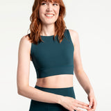Lolë Step Up Bra in emerald — this high-support longline sports bra sets you in motion