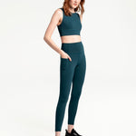 Lolë Step Up Bra in emerald — this high-support longline sports bra sets you in motion