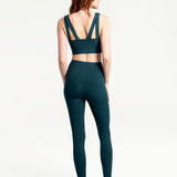 Lolë Step Up Bra in emerald — this high-support longline sports bra sets you in motion
