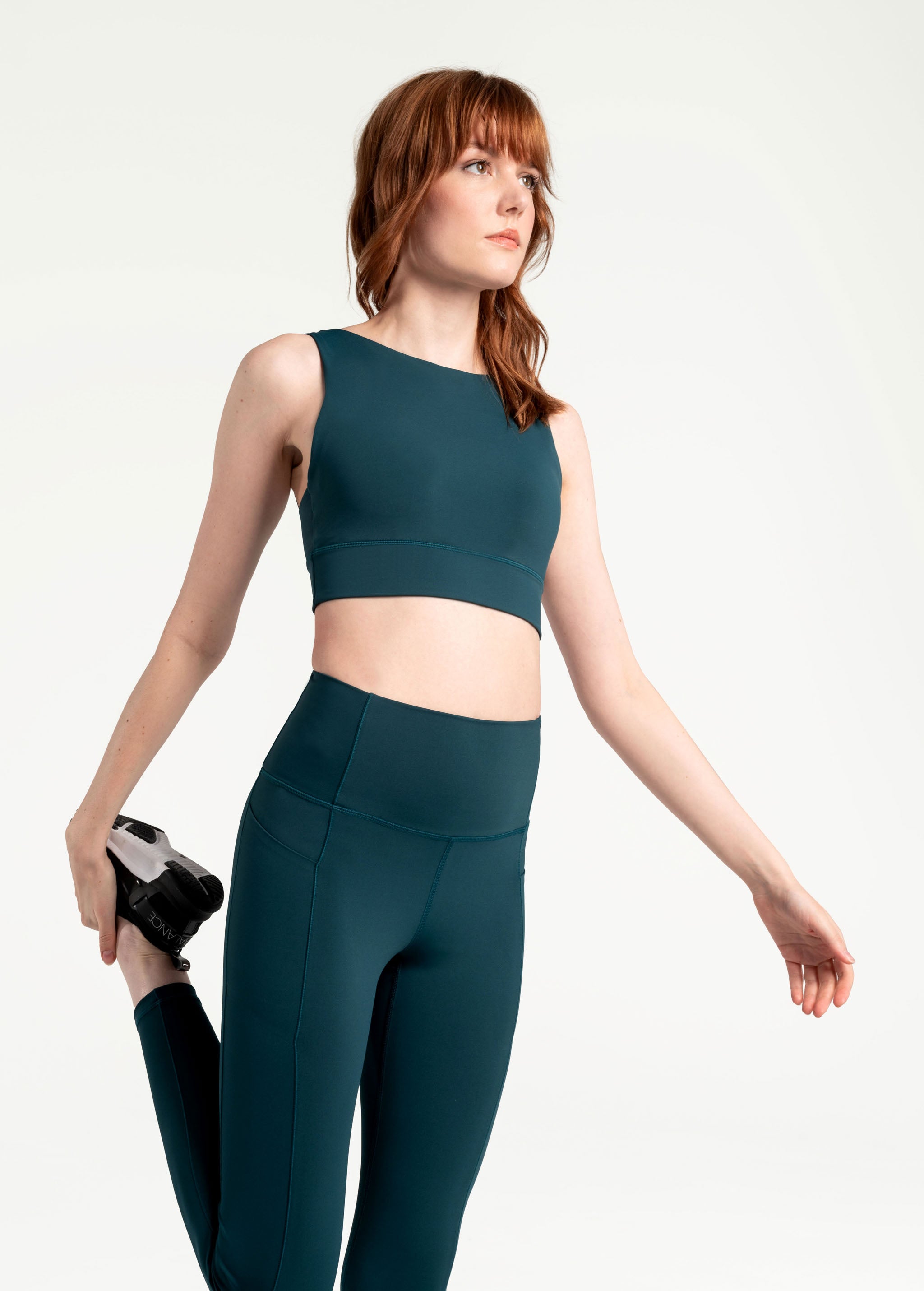 Lolë Step Up Bra in emerald — this high-support longline sports bra sets you in motion
