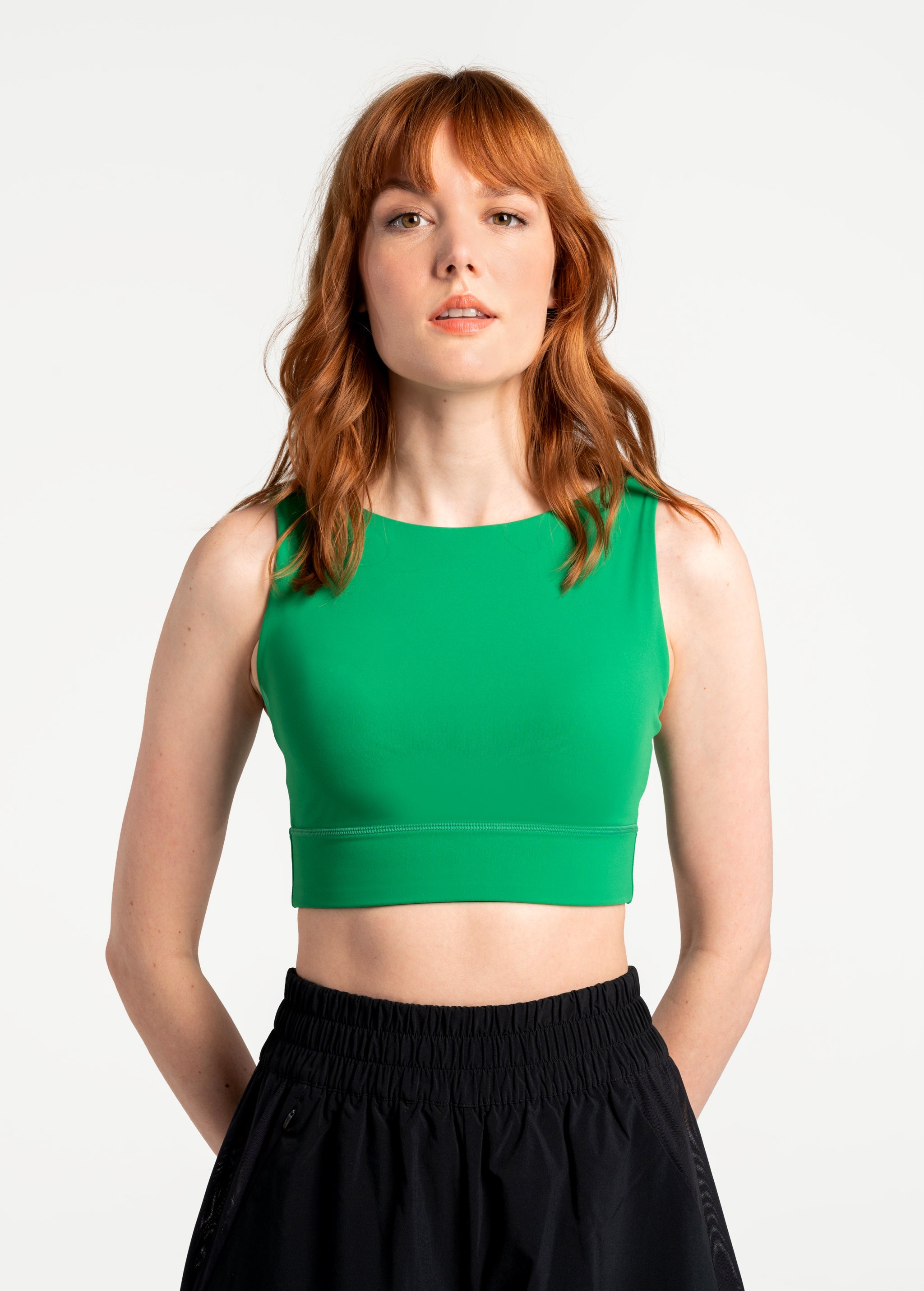 Lolë Step Up Bra in Jade green — this high-support longline sports bra sets you in motion
