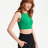 Lolë Step Up Bra in Jade green — this high-support longline sports bra sets you in motion