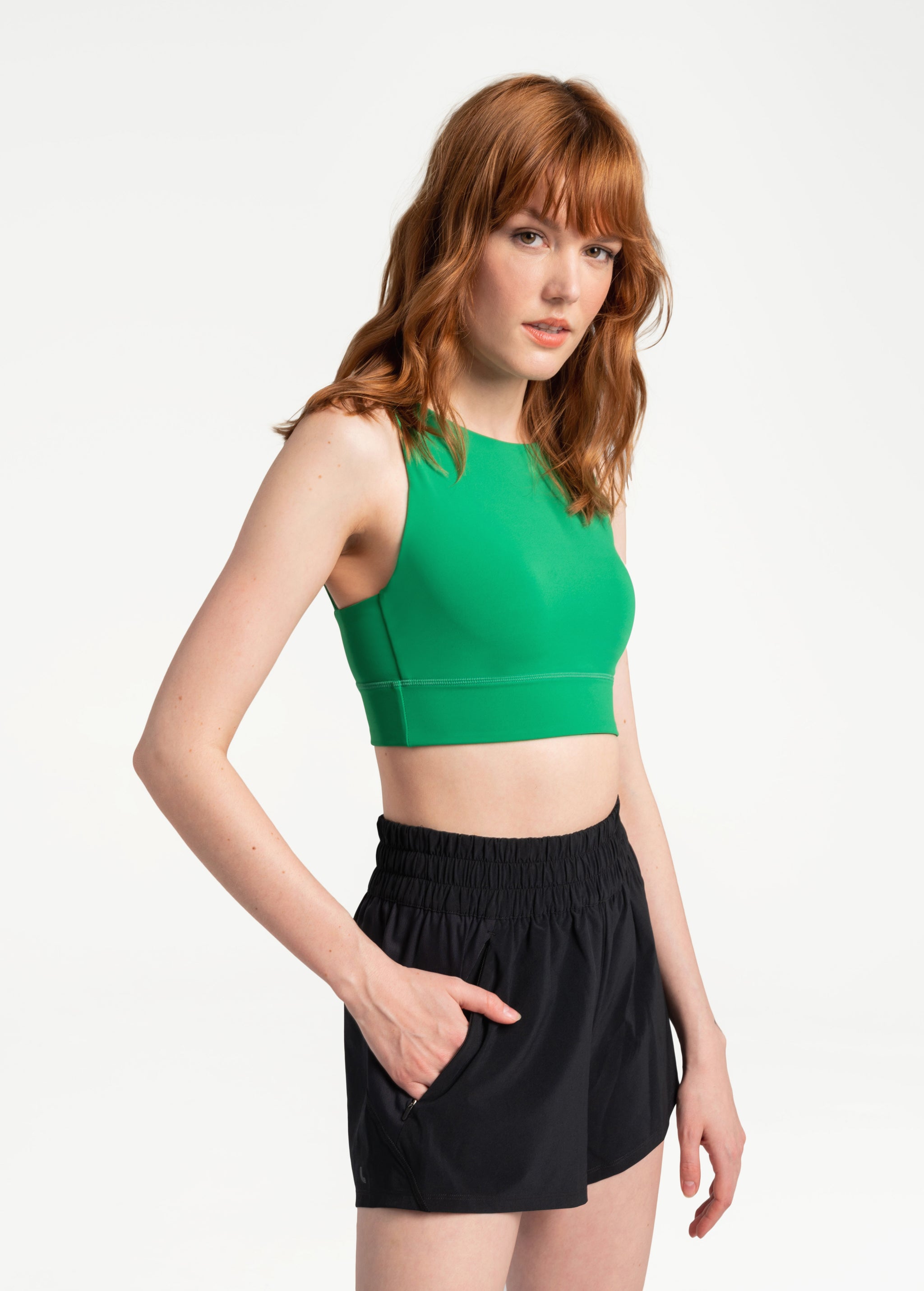Lolë Step Up Bra in Jade green — this high-support longline sports bra sets you in motion