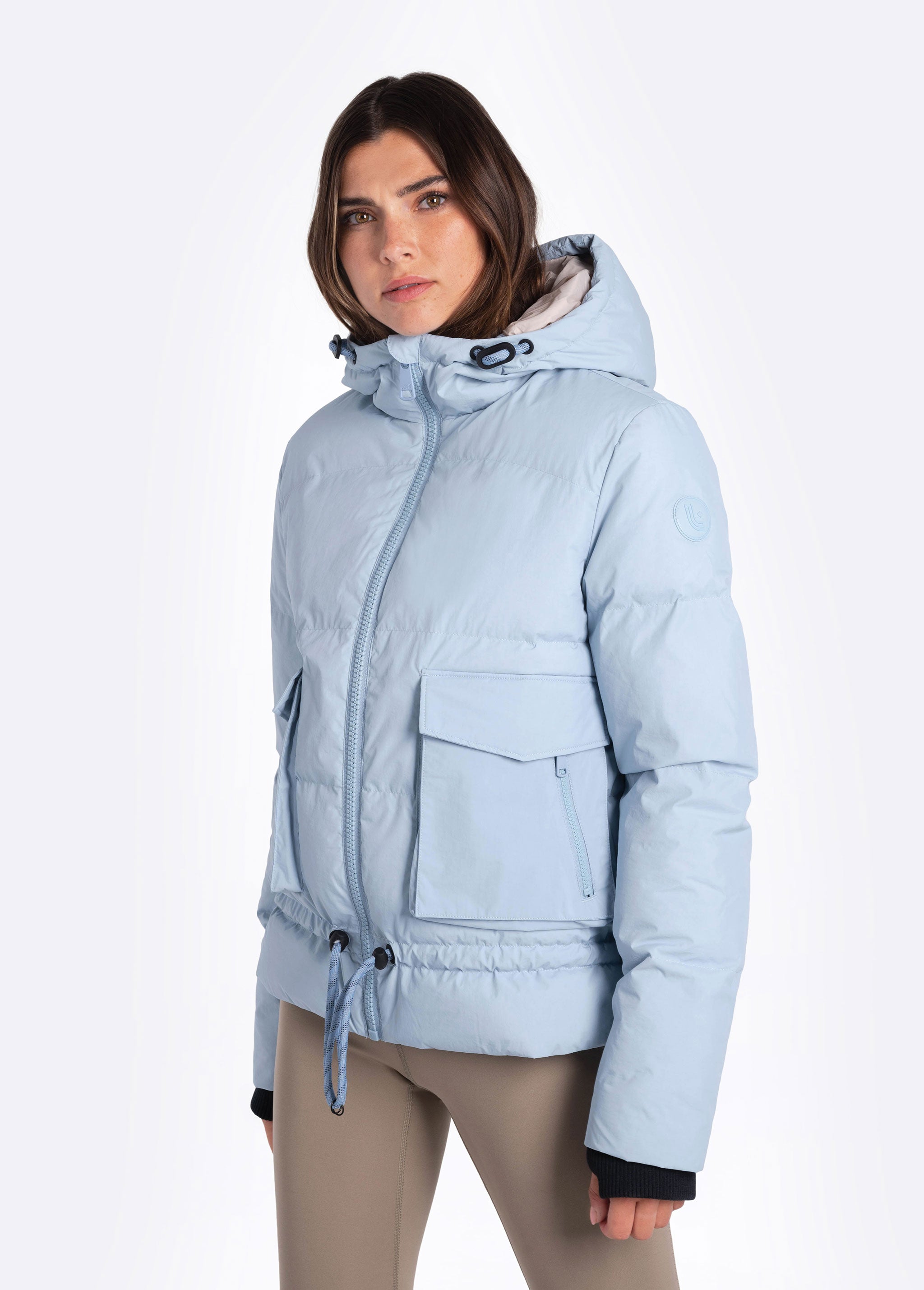 Lolë Kylee Synth Down Jacket in blue — complete with an inner pocket, in a relaxed silhouette