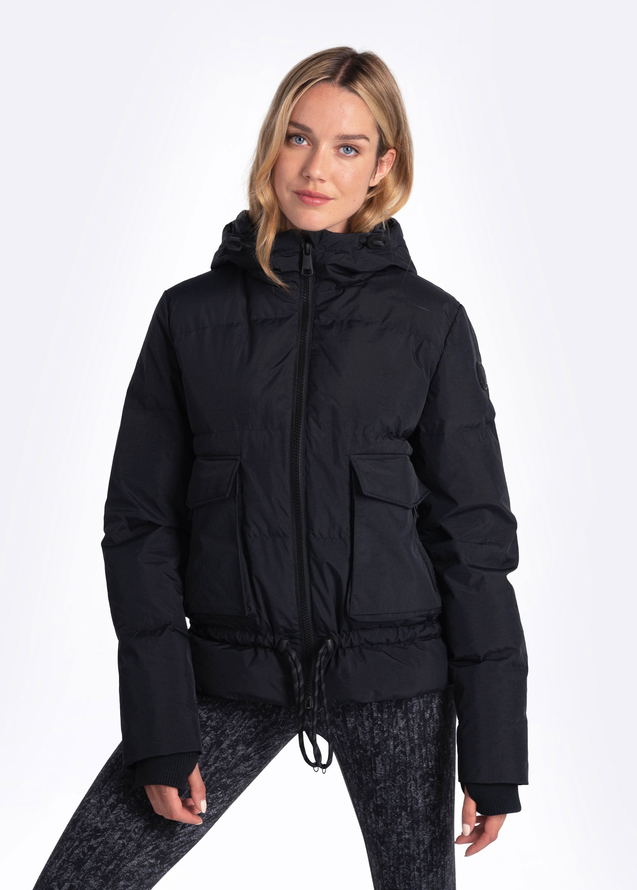 Lolë Kylee Synth Down Jacket in black — complete with an inner pocket, in a relaxed silhouette