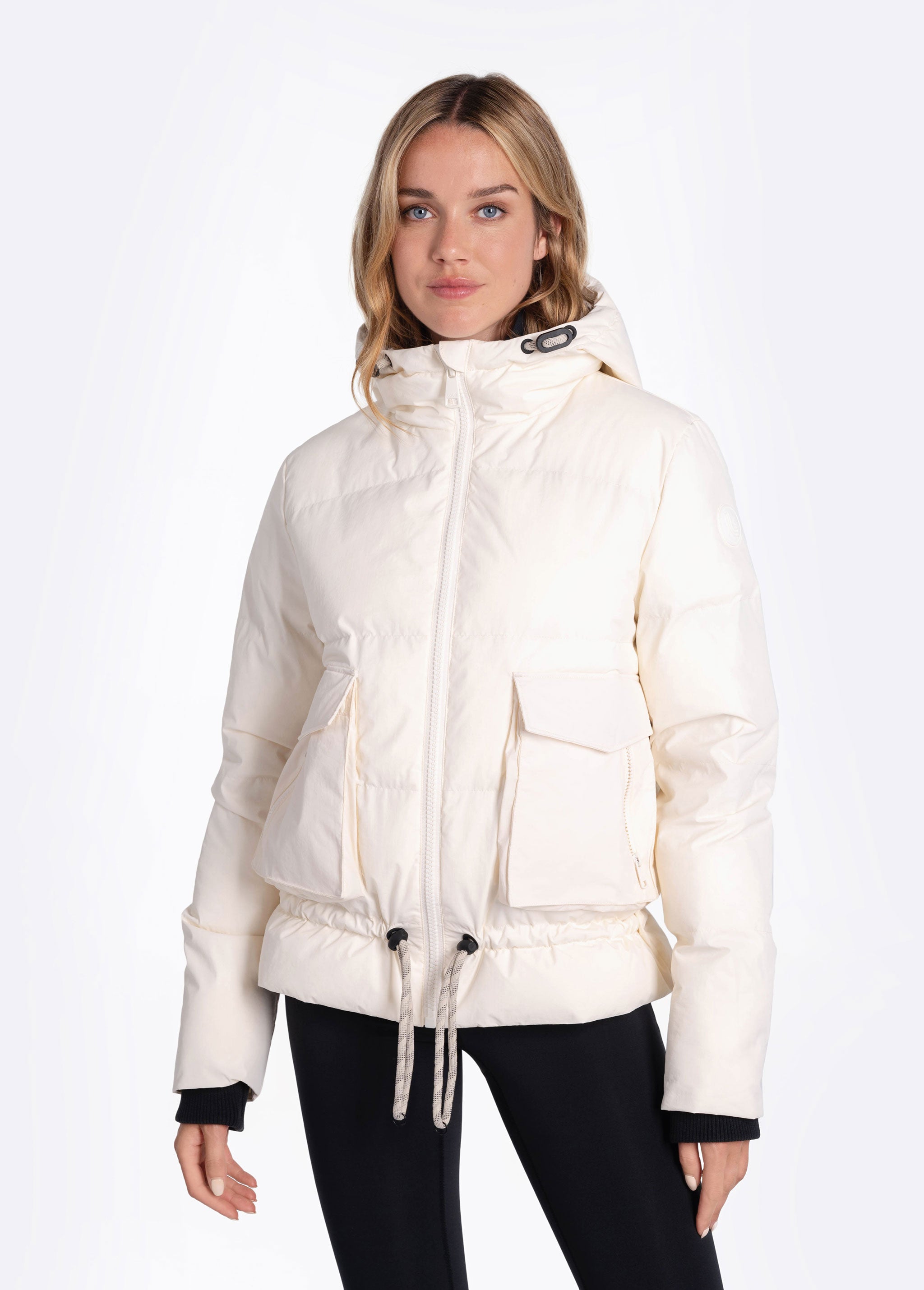 Lolë Kylee Synth Down Jacket in Gardenia cream — complete with an inner pocket, in a relaxed silhouette