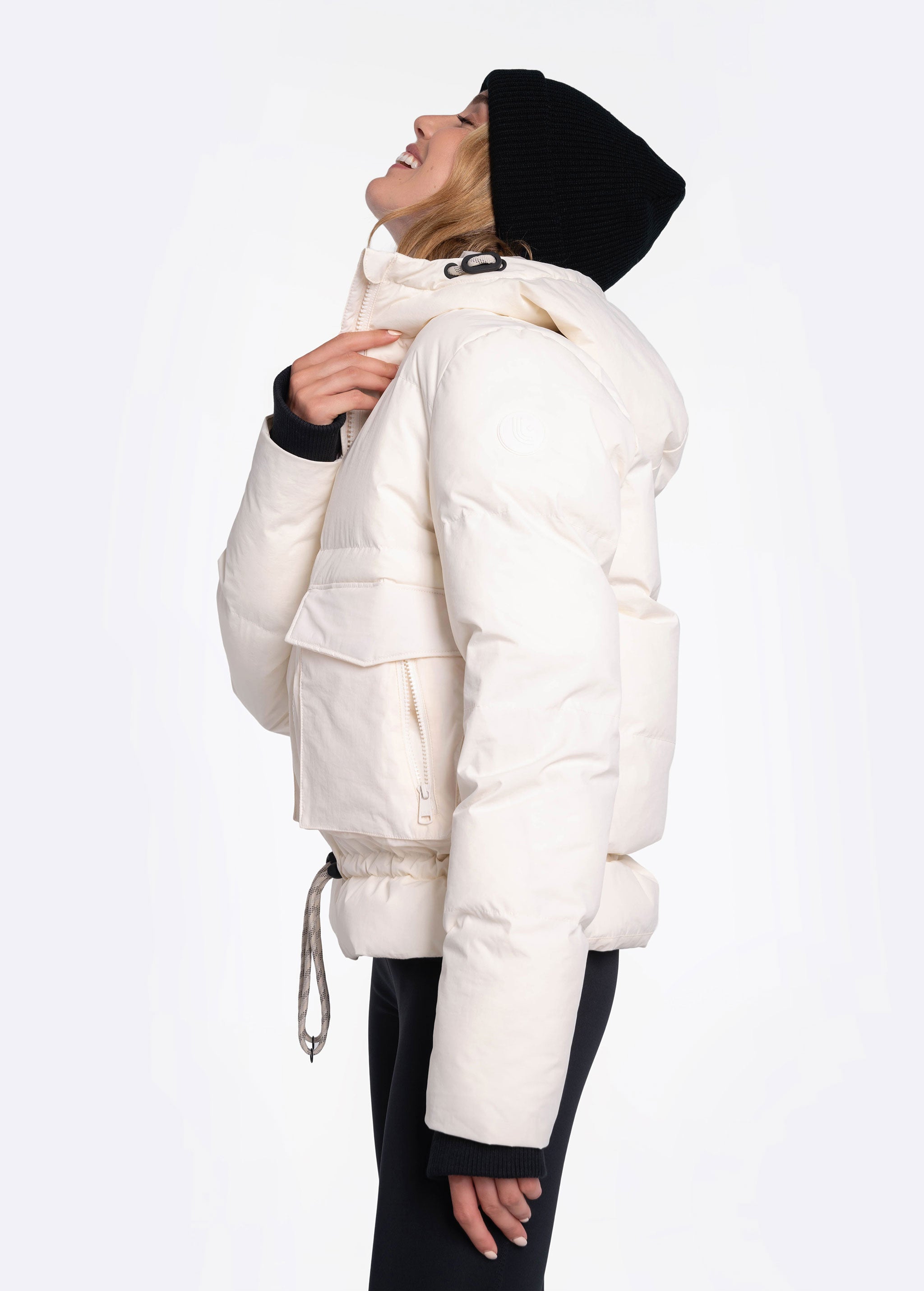 Lolë Kylee Synth Down Jacket in Gardenia cream — complete with an inner pocket, in a relaxed silhouette